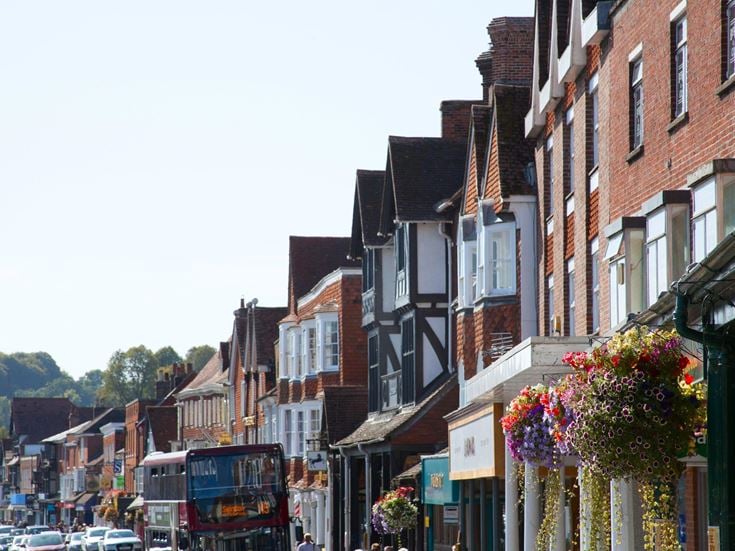 Historic high street in Marlborough with independent shops and traditional architecture
