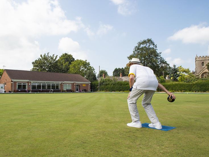 A retiree enjoying a game of bowling at Warminster Bowling Club.
