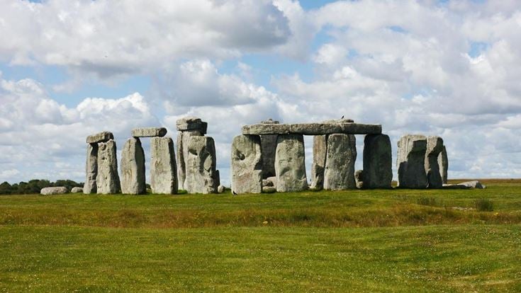 The ancient site of Stonehenge in Wiltshire, with clouds in the background.’