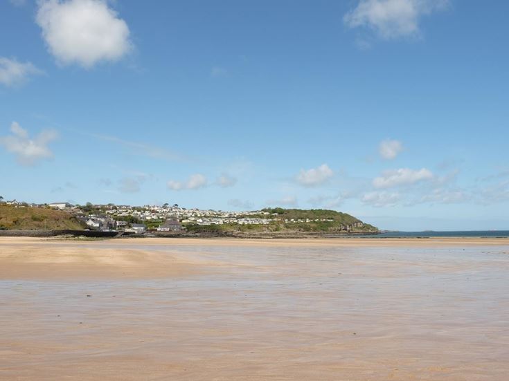 Benllech Beach with the town in the background.