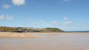 Benllech Beach with the town in the background.