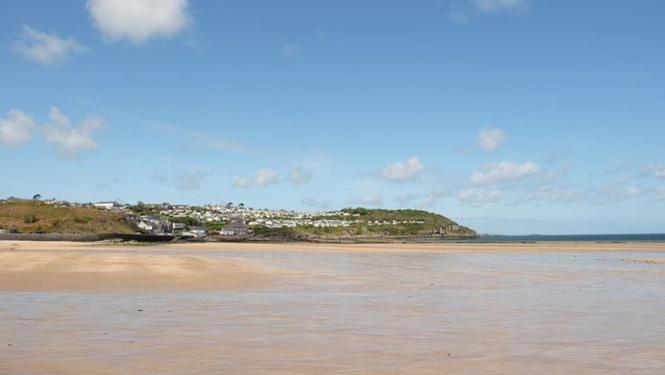 Benllech Beach with the town in the background.