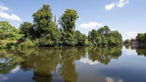A lake with trees around it.