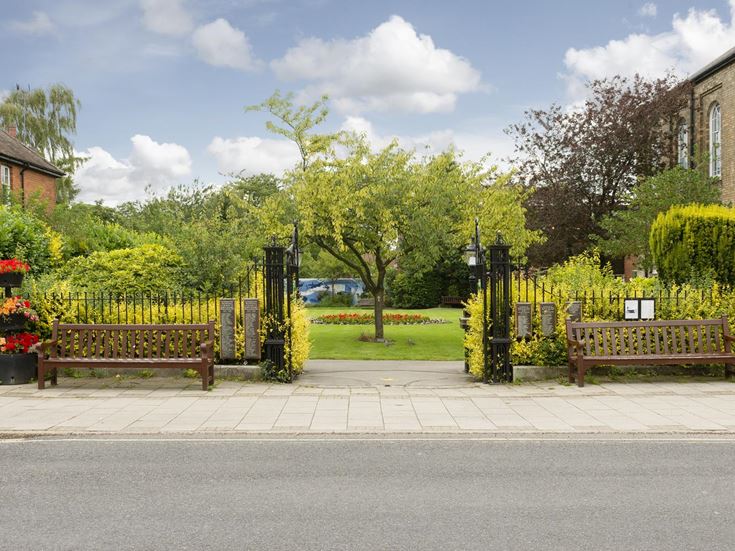 Open gates leads into Memorial Park Gardens in Cottingham.