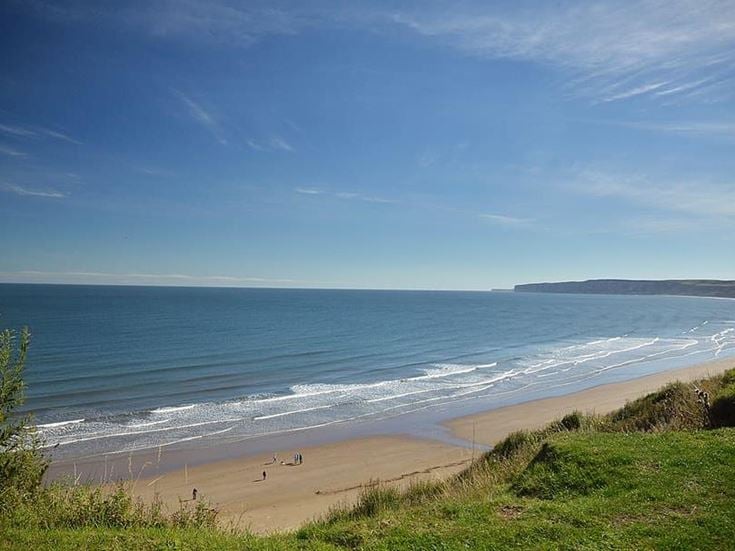 A scenic, sandy beach in North Yorkshire.
