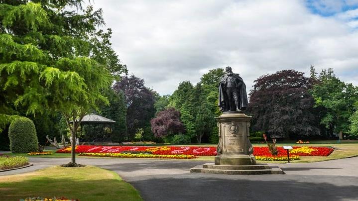 a statue in a park