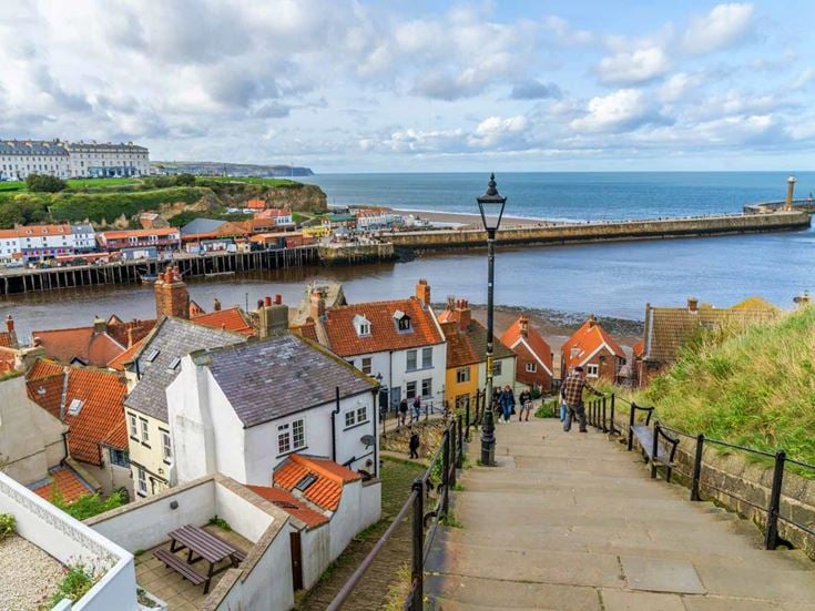A view of Whitby Pier and the harbour from 199 Steps