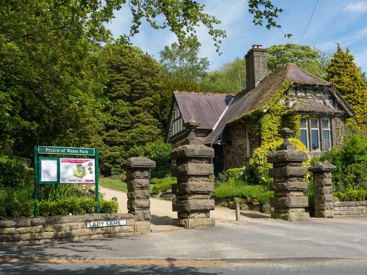 a stone building with a sign