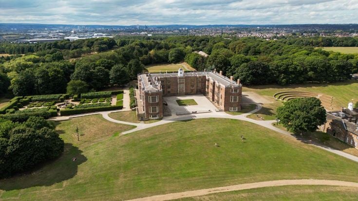 aerial photo of Temple Newsam house and it's grounds with Leeds city in the distance