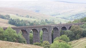 A viaduct looming over the countryside outside of Leeds