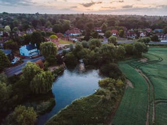 a river with a small town