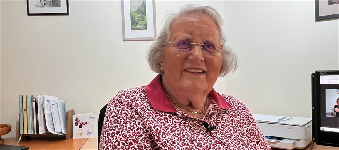 a woman wearing glasses