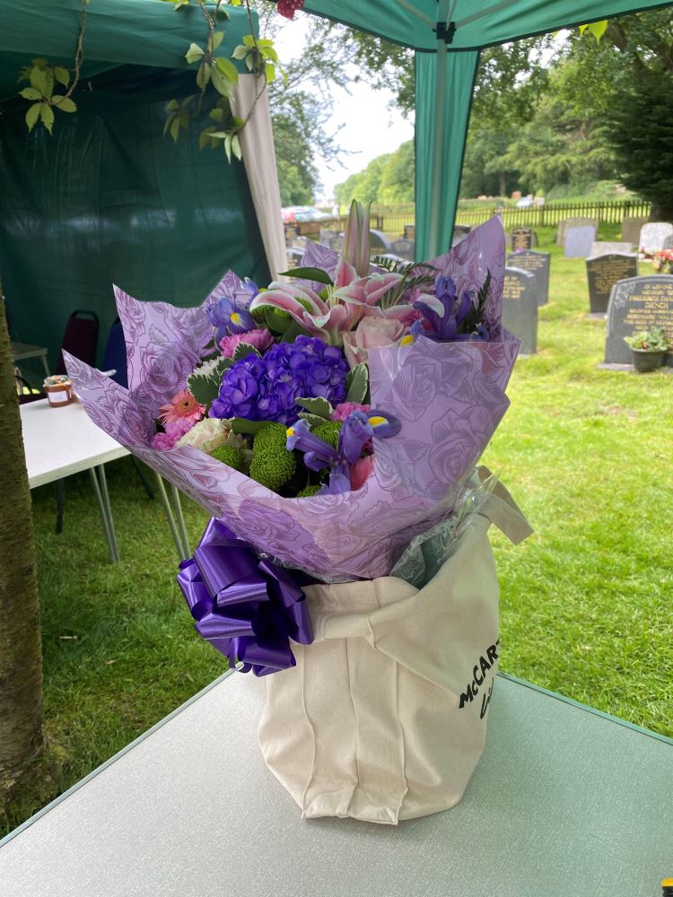 a bouquet of flowers on a table