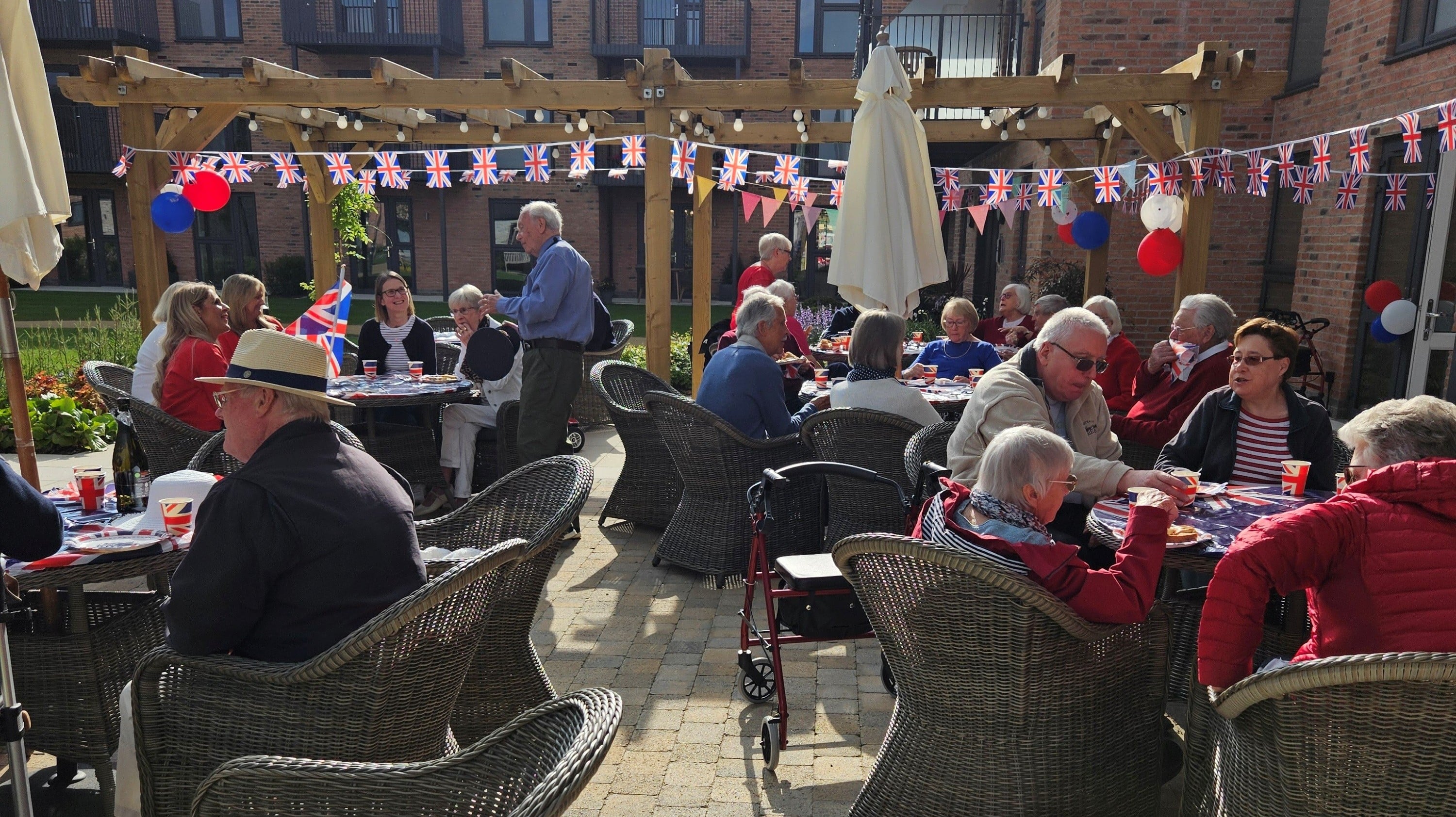 a group of people sitting at tables