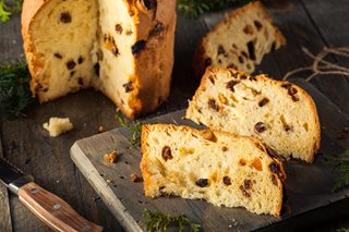 a group of bread on a wooden board