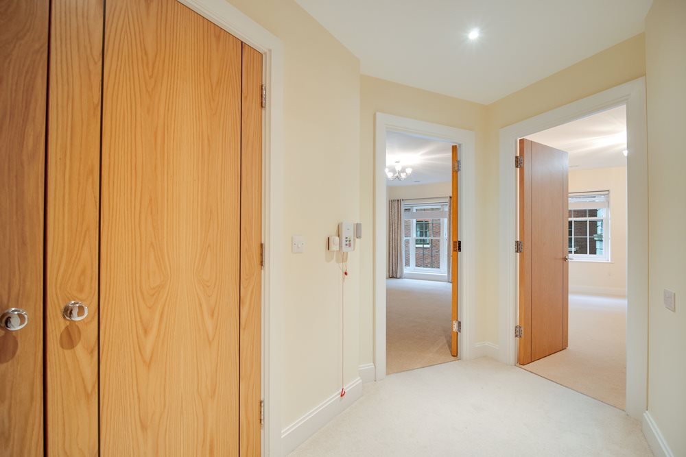 a room with a door and a window