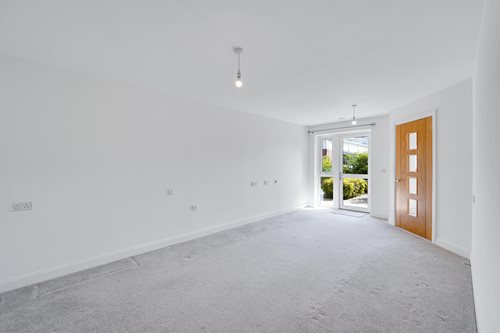 a room with a door and a window