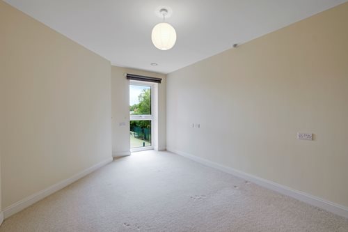 a hallway with a light on the ceiling