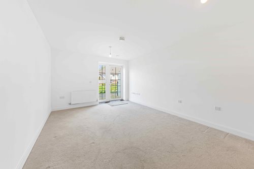 a hallway with white walls