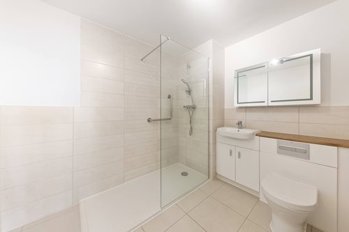 a bathroom with a glass shower