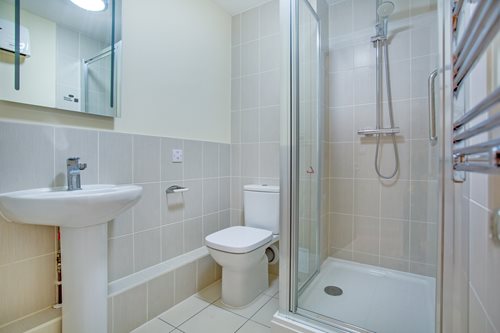 a bathroom with a glass shower