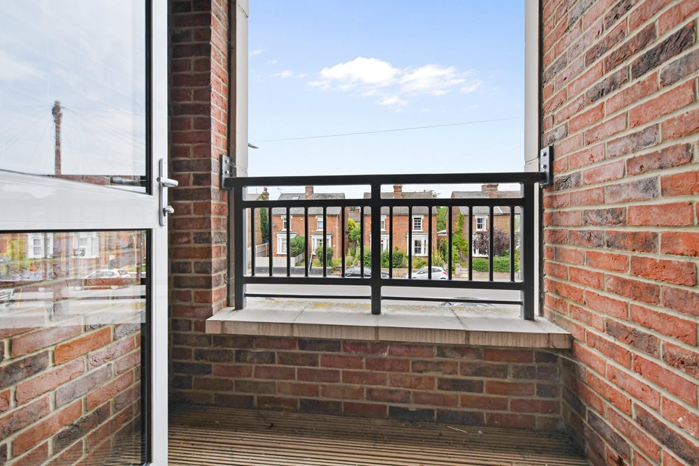 a gate in a brick building