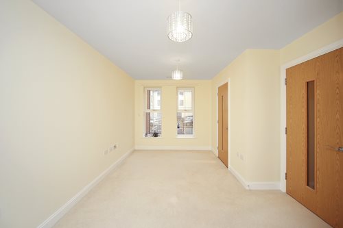 a room with a light on the ceiling