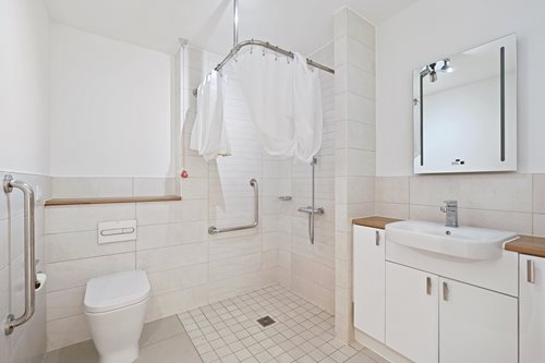 a bathroom with a toilet and sink