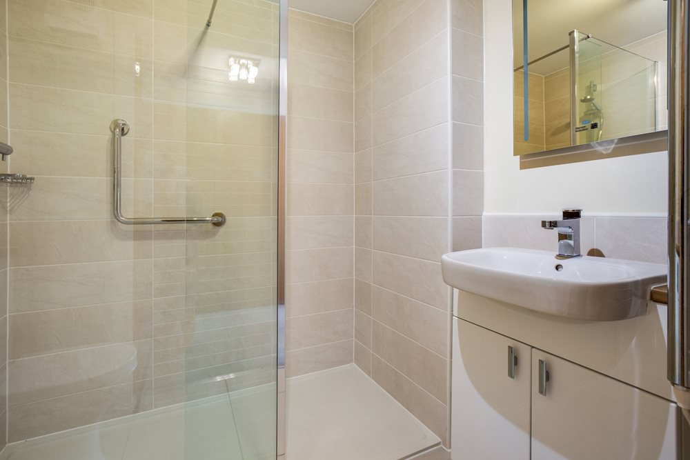 a bathroom with a glass shower