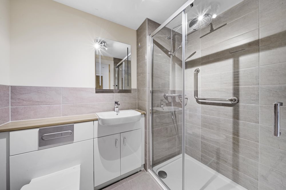 a bathroom with a glass shower