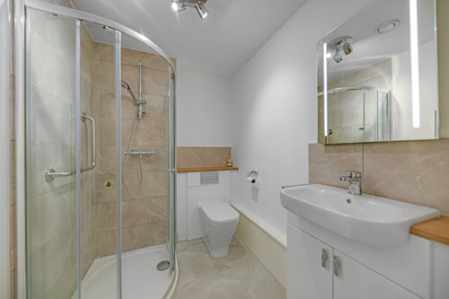 a bathroom with a glass shower