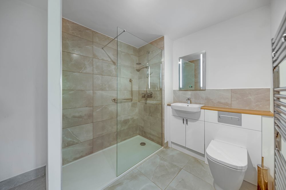 a bathroom with a glass shower