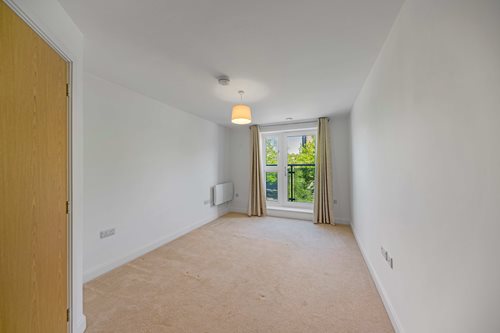 a hallway with a light on