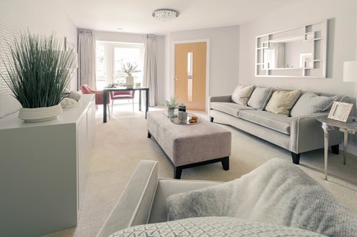 a living room with a couch and a coffee table