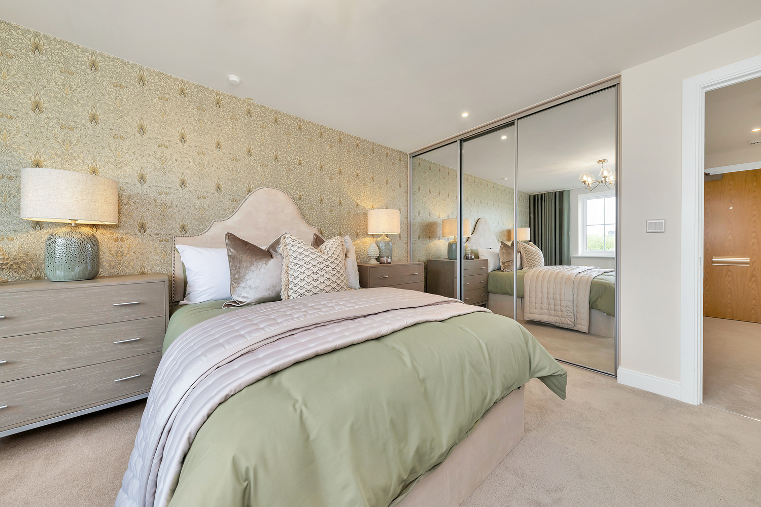 a bedroom with a large mirror