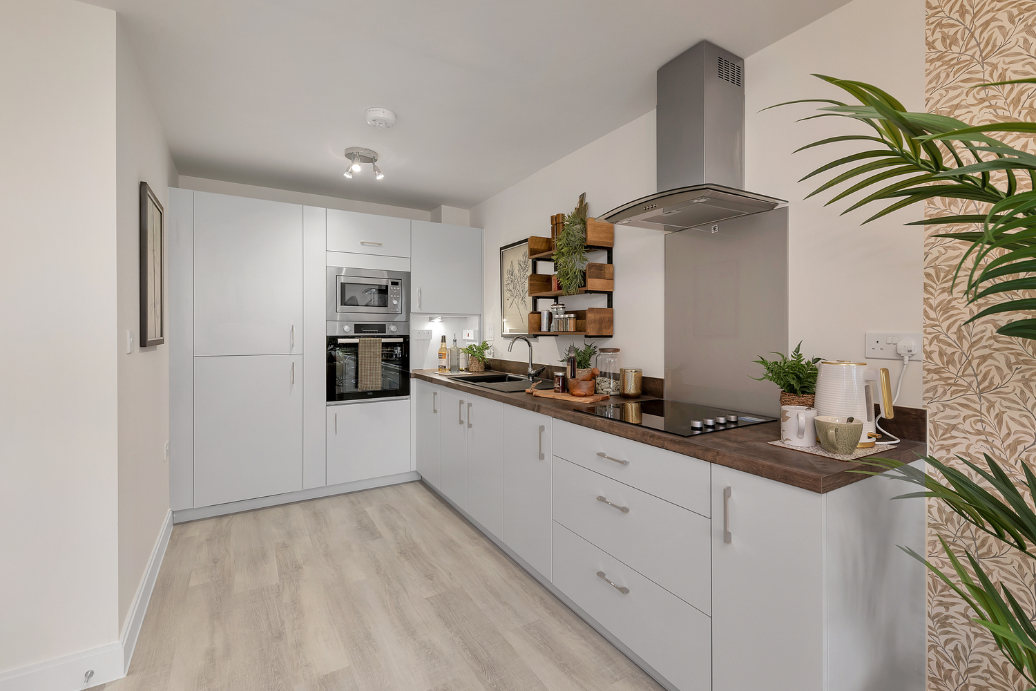 a kitchen with white cabinets