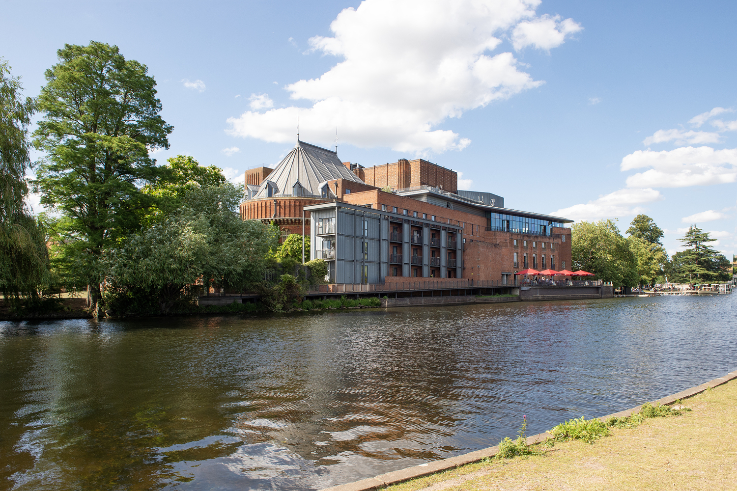 a large building next to a body of water