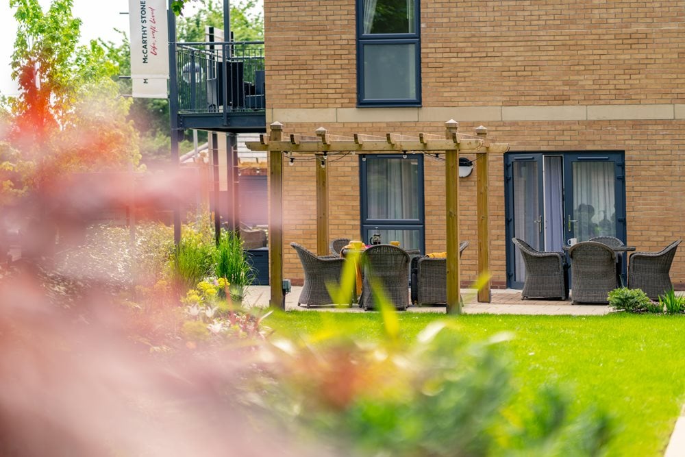 a building with a group of chairs outside
