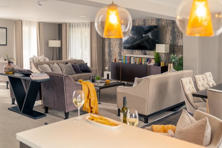 a living room with a couch and a table