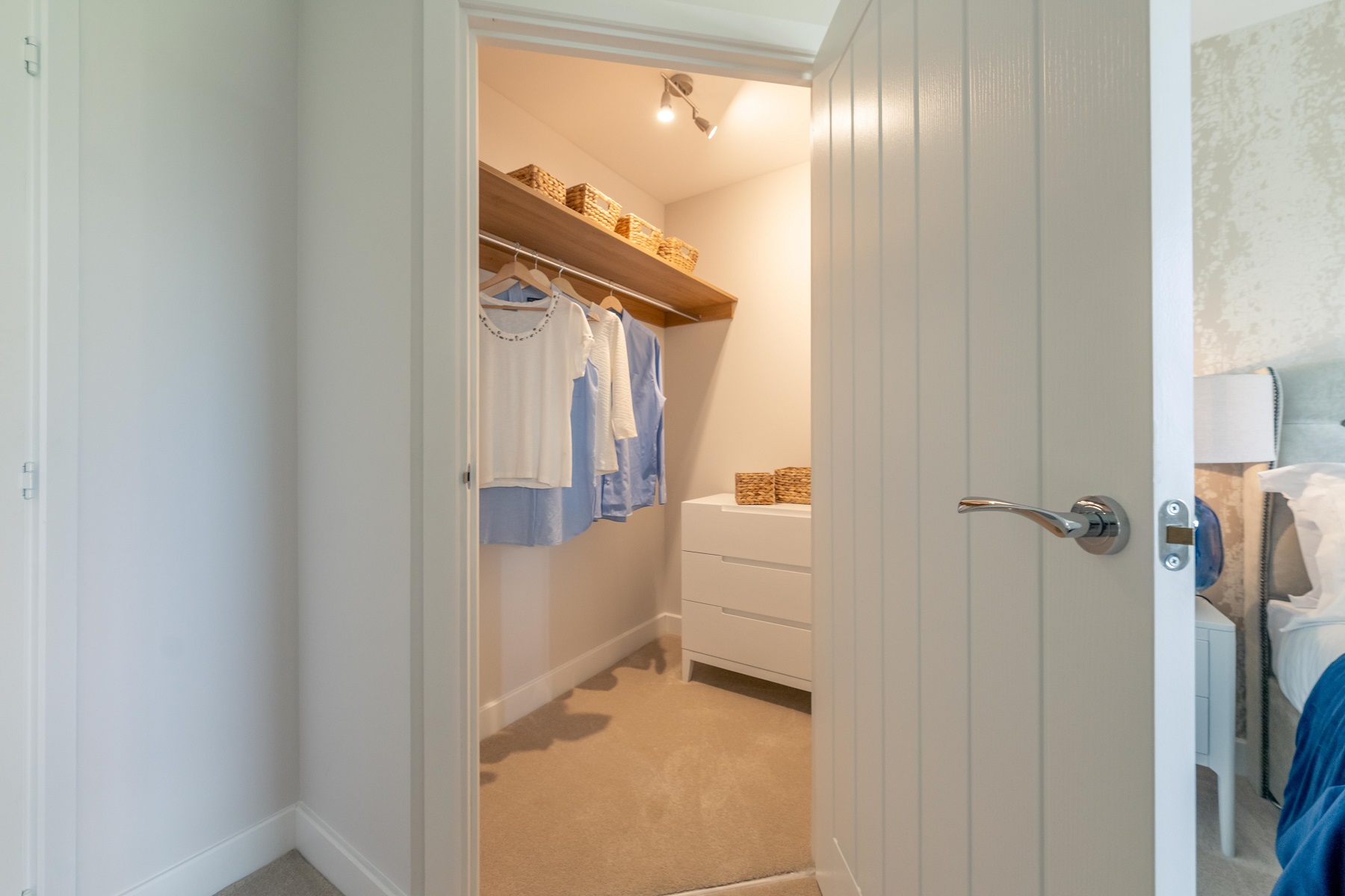 a bathroom with a door open