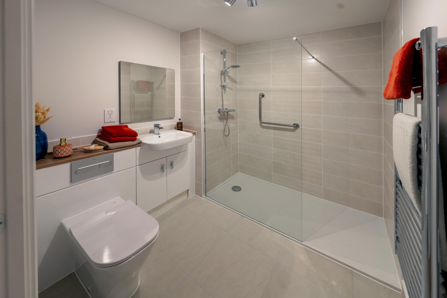 a bathroom with a shower and toilet