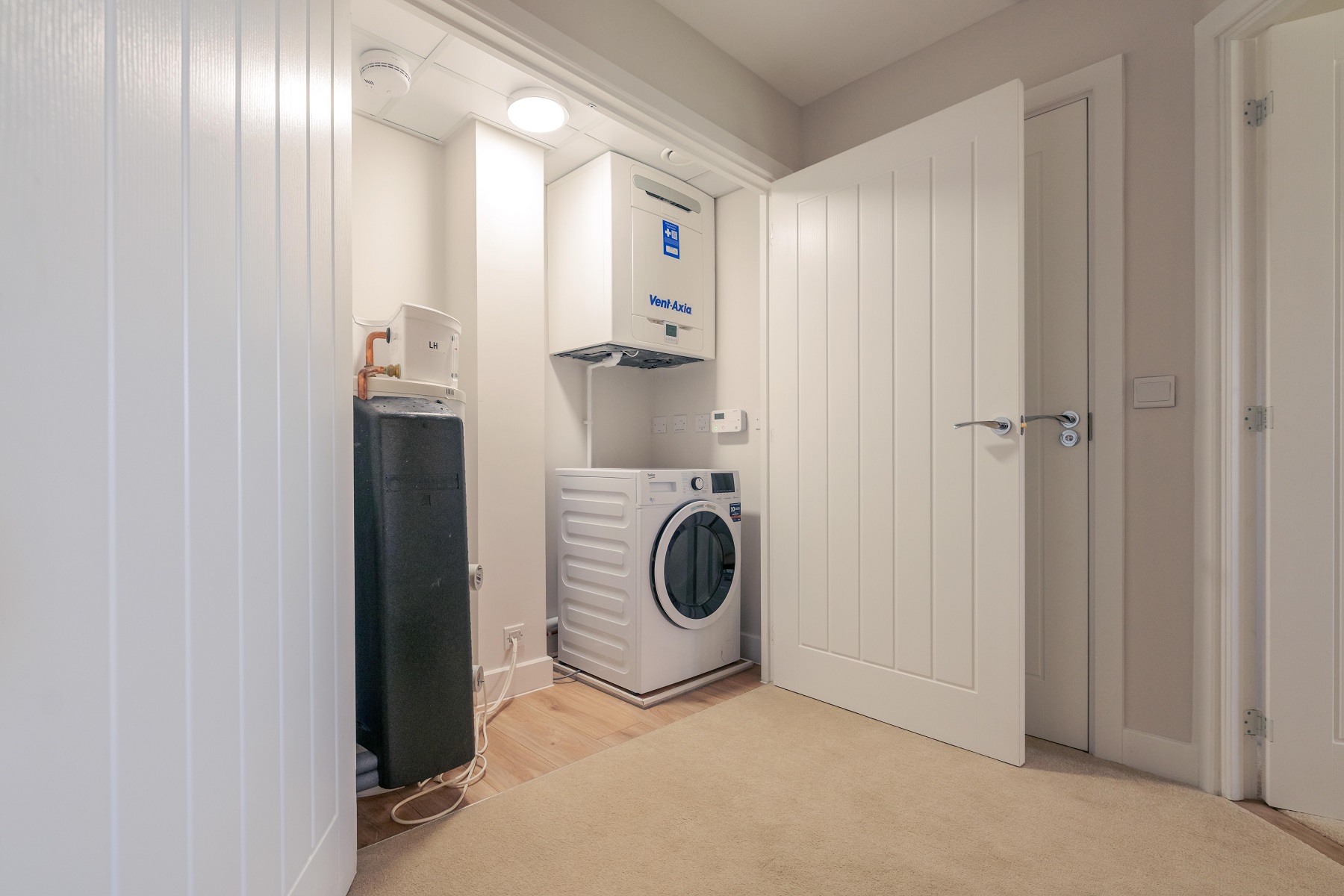 a laundry room with washing machine and dryer