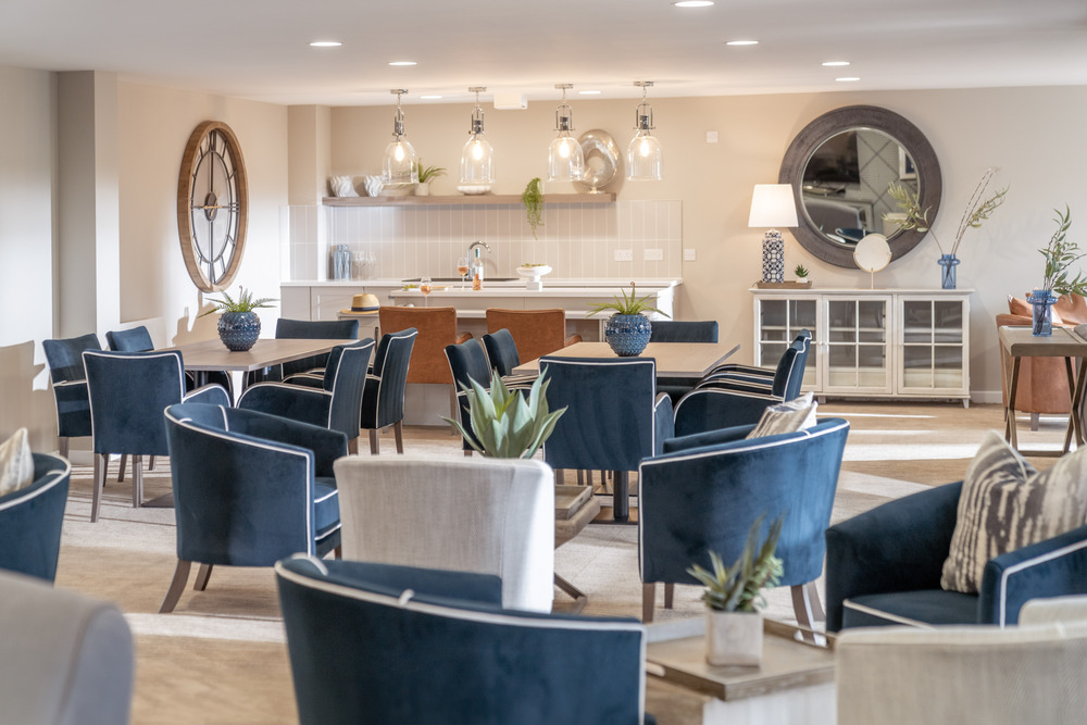 a room with chairs and tables