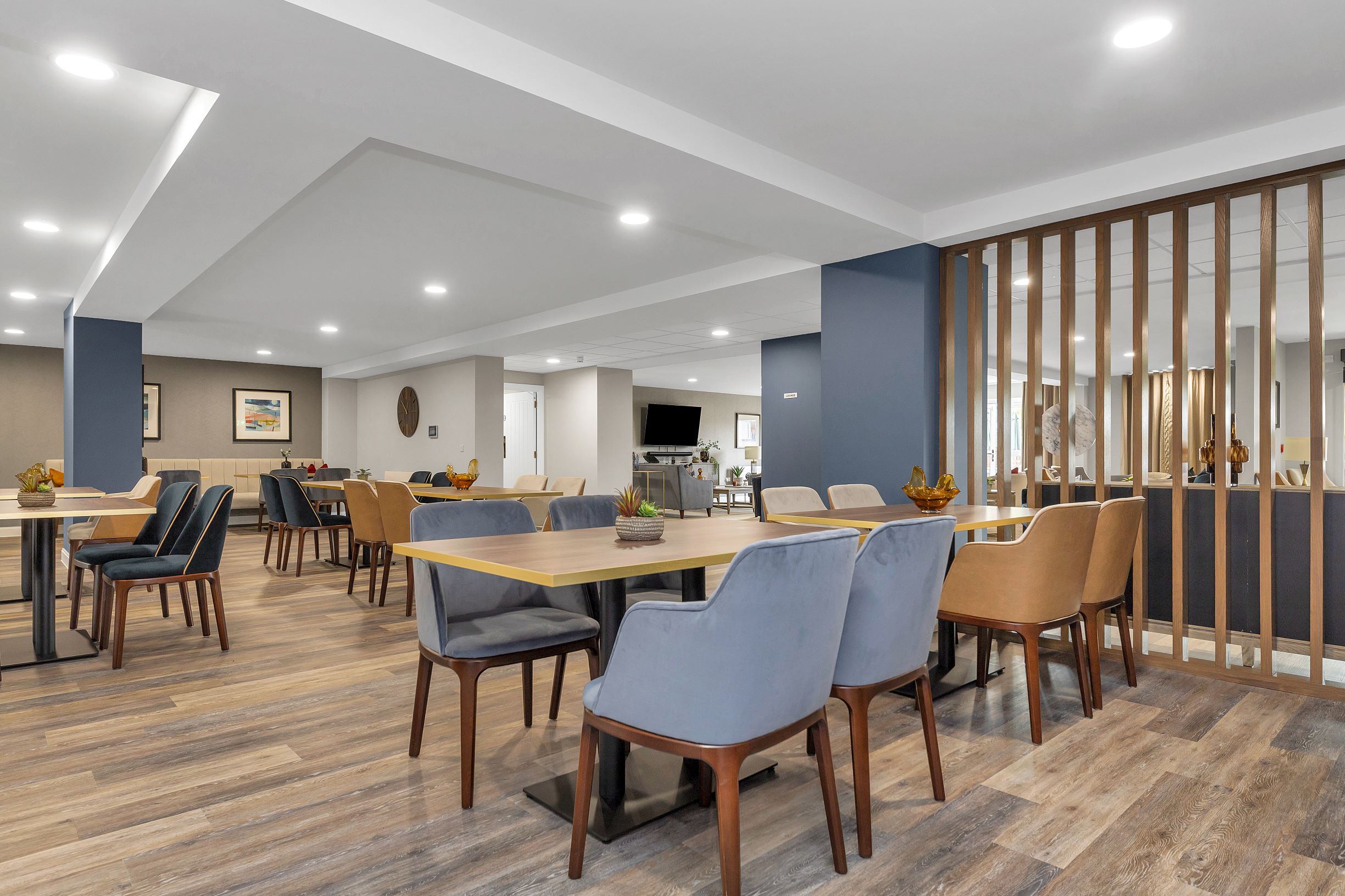 a dining room with a wood floor