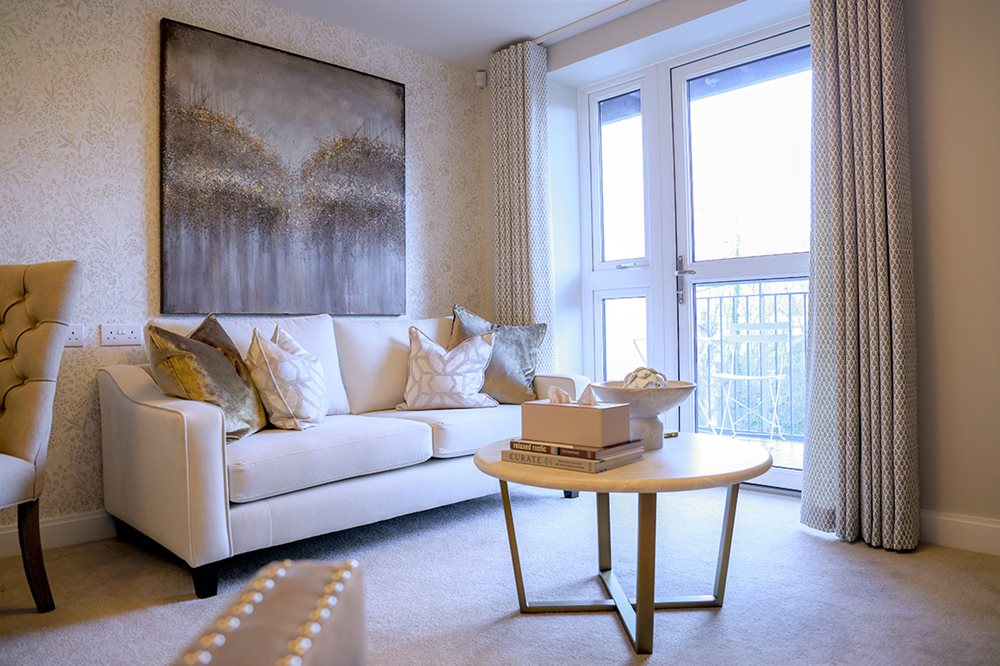 a living room with a couch and a coffee table
