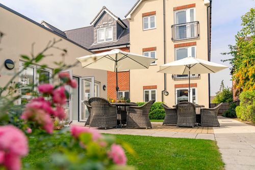 a house with a patio and chairs