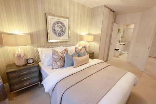 a bedroom with lamps
