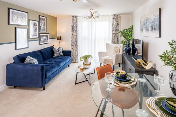 a living room with a blue couch