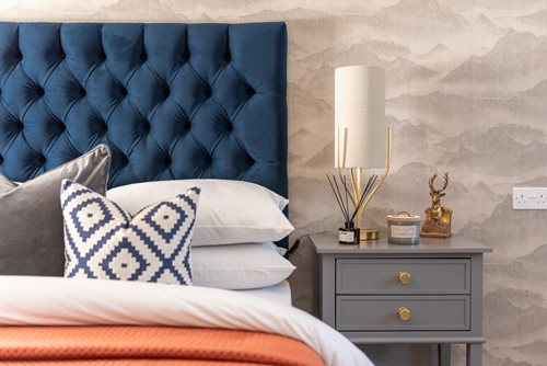 a couch with a lamp on it