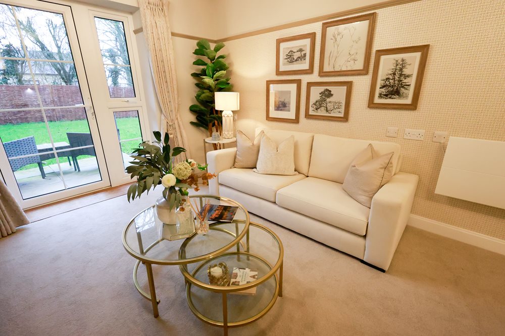 a living room with a white couch and a coffee table